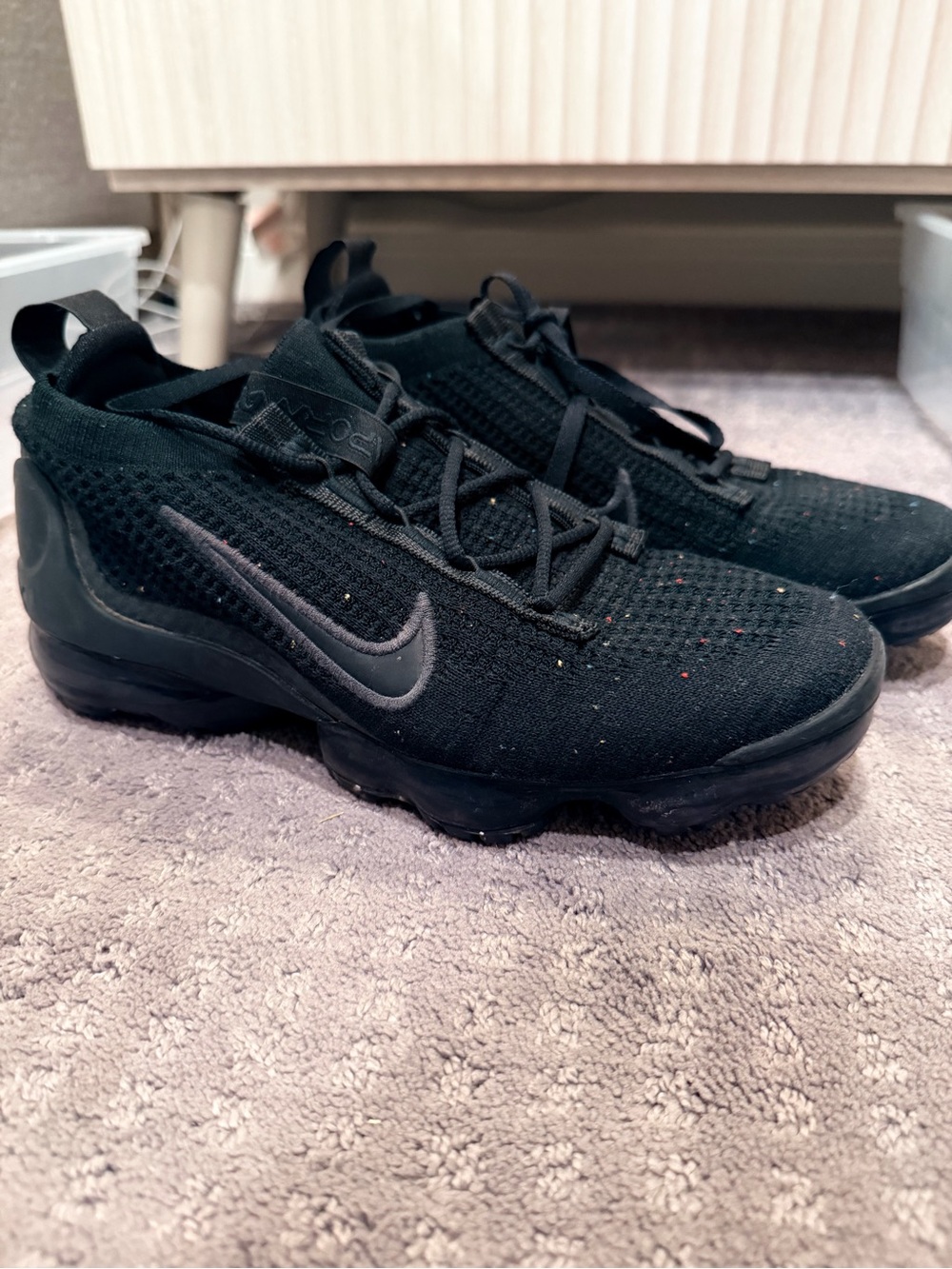 Nike Kids Black Flyknit-Style Sneaker with Subtle Gray Swoosh